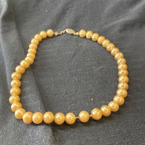 Child’s pearl necklace